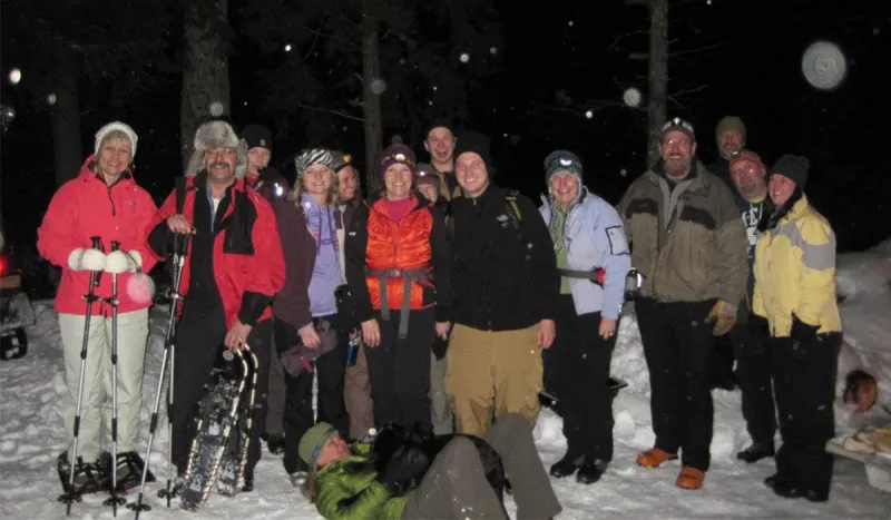 Group gathers on the trails for a full moon ski & bonfire. (Tupper Lake Groomed Cross Country Ski Center photo)