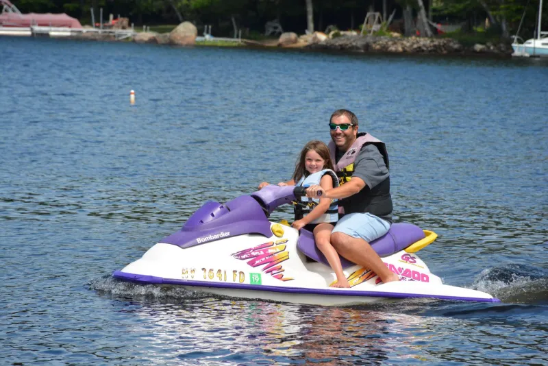 Jerry Scotti, the eldest of Frank and Sue Scotti's children, and his daughter Lucia, take off for a quick spin on the lake.