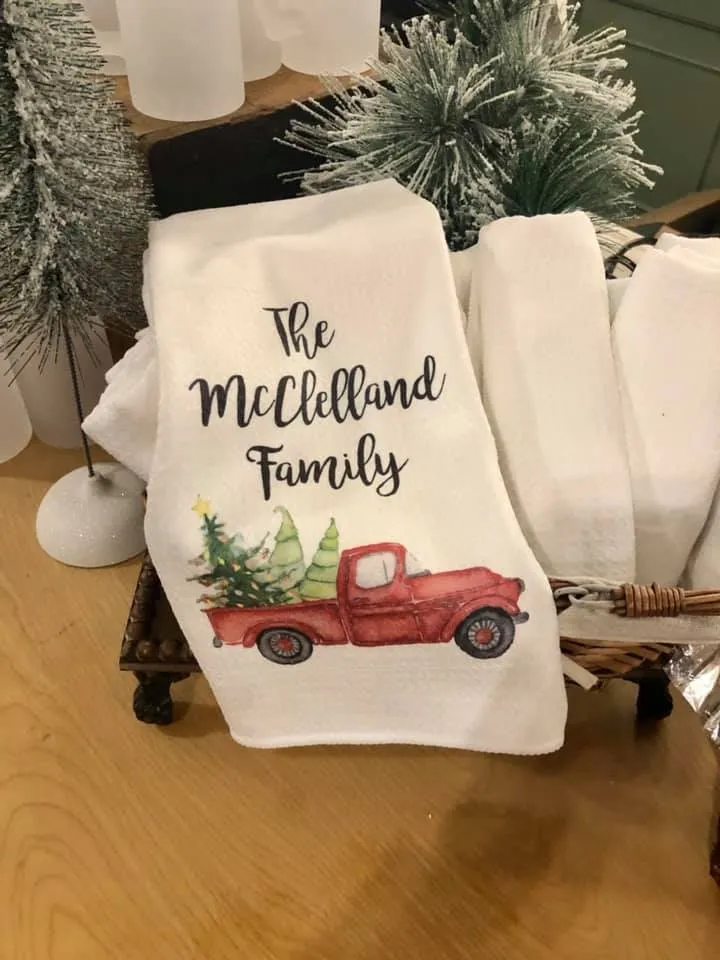 Spruce and Hemlock hand towel with a red truck on it.