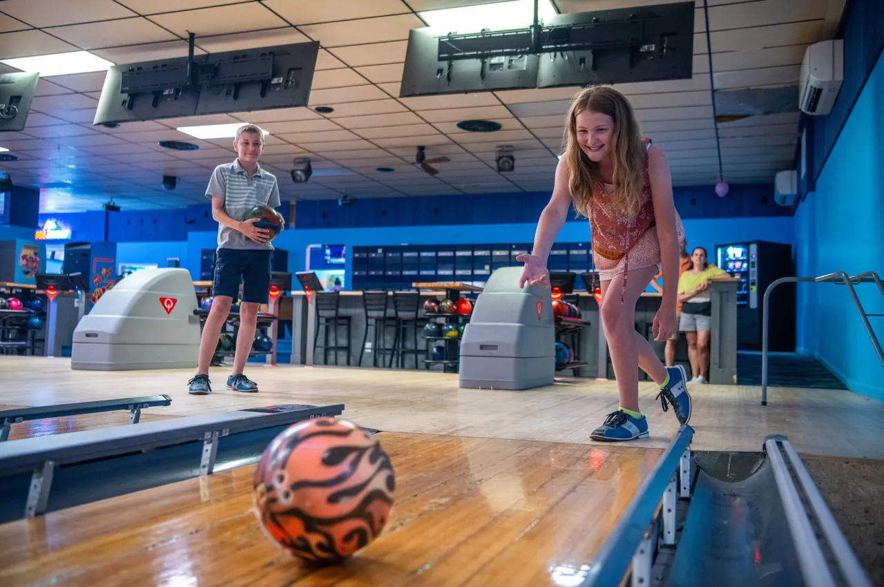 A family bowling together.