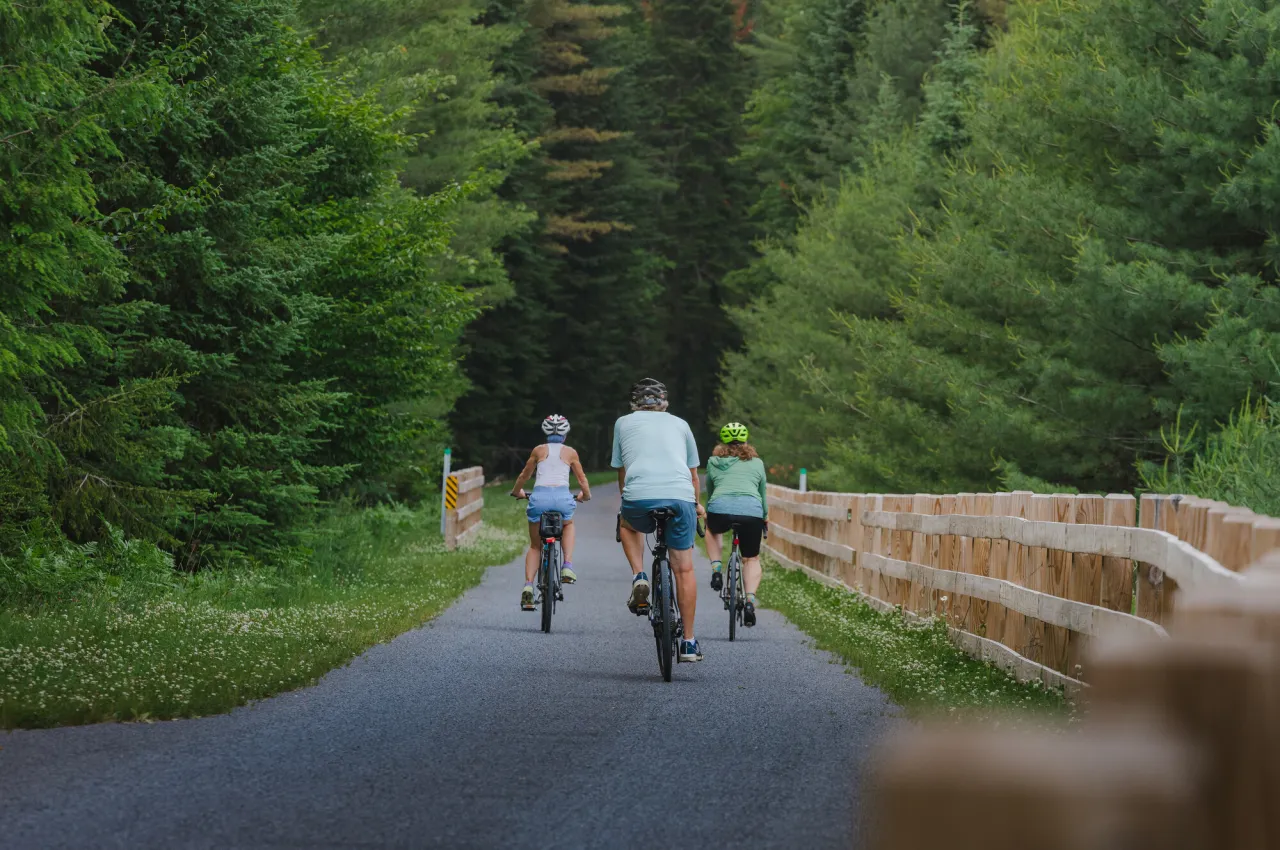 Biking on the Rail Trail in Tupper Lake.