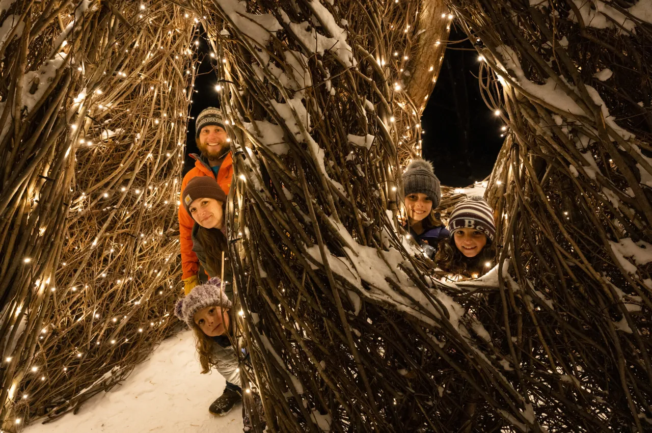 A family at The Wild Center's Wild Lights.