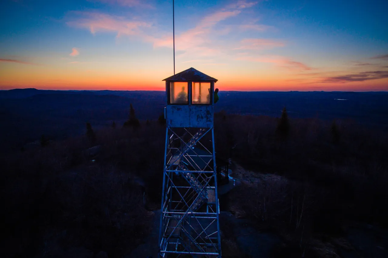 A fire tower at sunset.