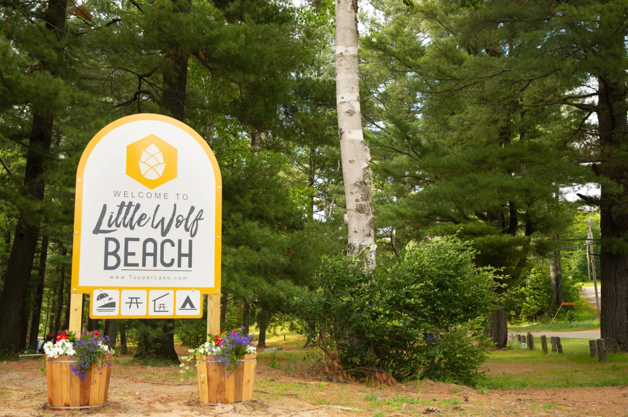 A sign for Little Wolf Beach Campground. 