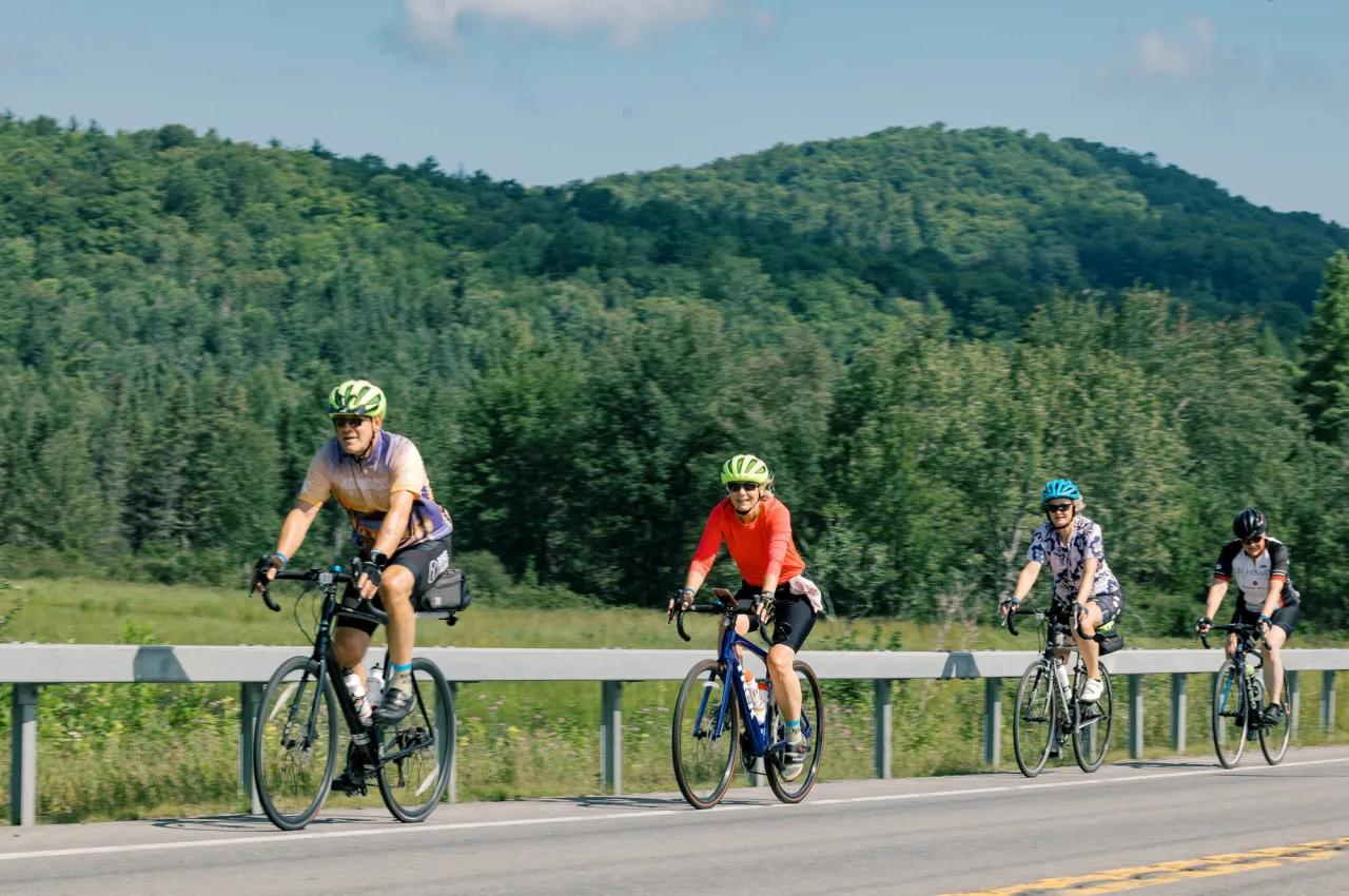 Riding bikes on the road.