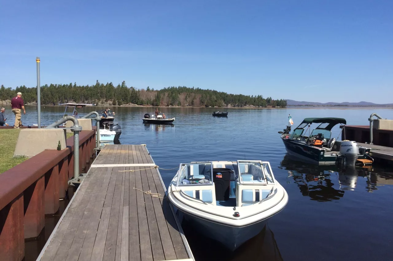 Several boats on the water near the Big Tupper boat launch