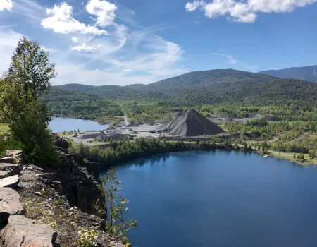 Blue skies over a body of water.