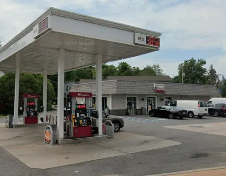 The road side view of Stewart's Shops in Tupper Lake with gas pumps and ample parking.