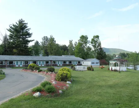 The green lawn outside Sara Placid Inn & Suites.