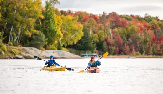 A couple kayakers in the fall