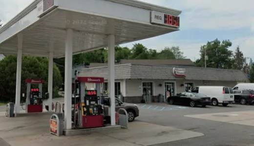 The road side view of Stewart's Shops in Tupper Lake with gas pumps and ample parking.