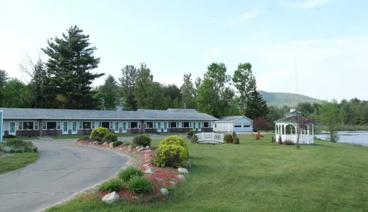 The green lawn outside Sara Placid Inn & Suites.