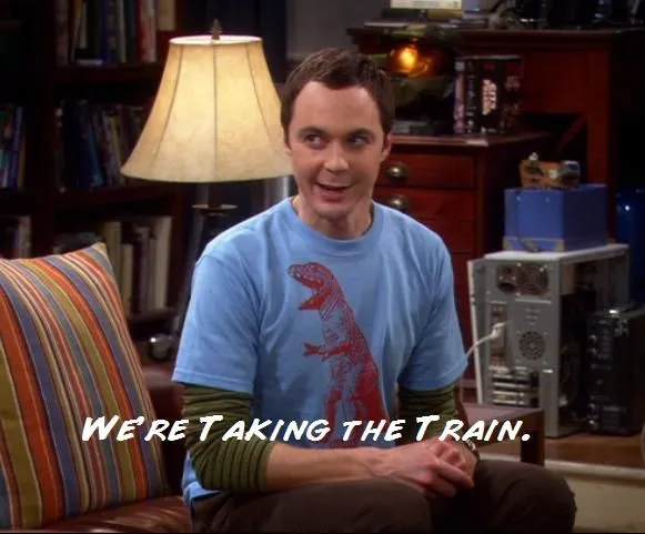 An image of a male character on a tv show, smiling, with overlaid copy that reads "we are taking the train."