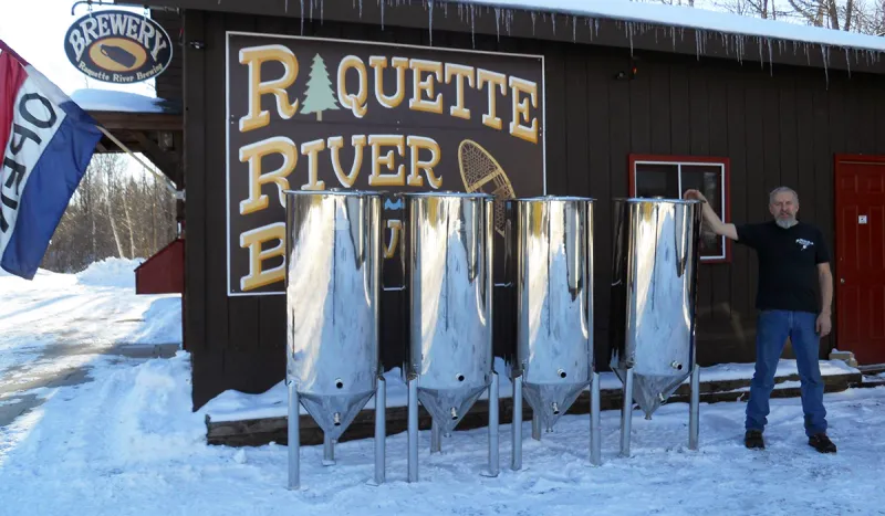 Raquette River Brewing receives a shipment of 4 new fermenters, which will allow them to double their production by summer.