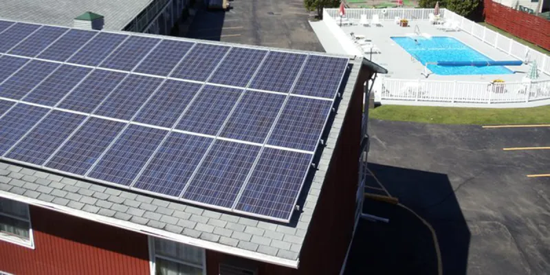 Solar panels line the roof at Shaheen's Motel in Tupper Lake