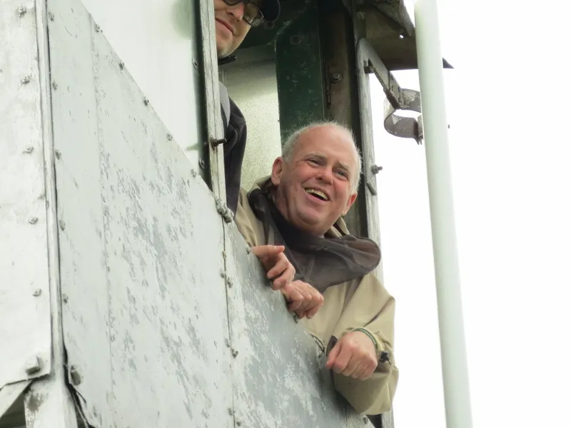 Thomas Cullen & Frank Delisle looking down from the fire tower