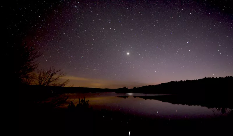 Venus reflects off Rock Island Bay in Tupper Lake, NY (Marc Staves photo)