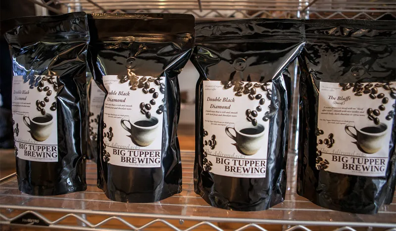 Big Tupper Brewing's Double Black Diamond whole bean coffee on the shelf at Well Dressed Food in Tupper Lake (ROOST/Shaun Ondak photo)