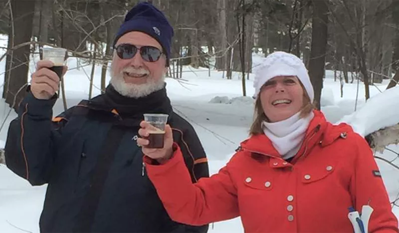 Participants enjoy sampling local brews on the trails of the Tupper Lake Cross Country Ski Center during the annual Brew-Ski.