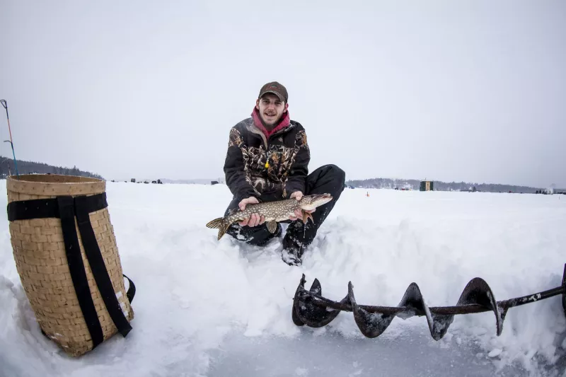 Setting up during the Norther Challenge Ice Fishing Derby.