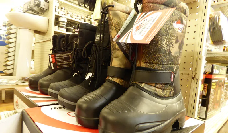 Finding the perfect fitting ice fishing boot at Fortune's True Value on Main Street in Tupper Lake.
