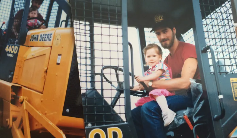 Me riding in the skidder with my dad (mid-1980's). Seriously though, what's with the knee-socks?