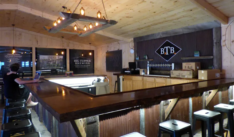 The shiny new bar at Big Tupper Brewing is gearing up for the busy weekend ahead.