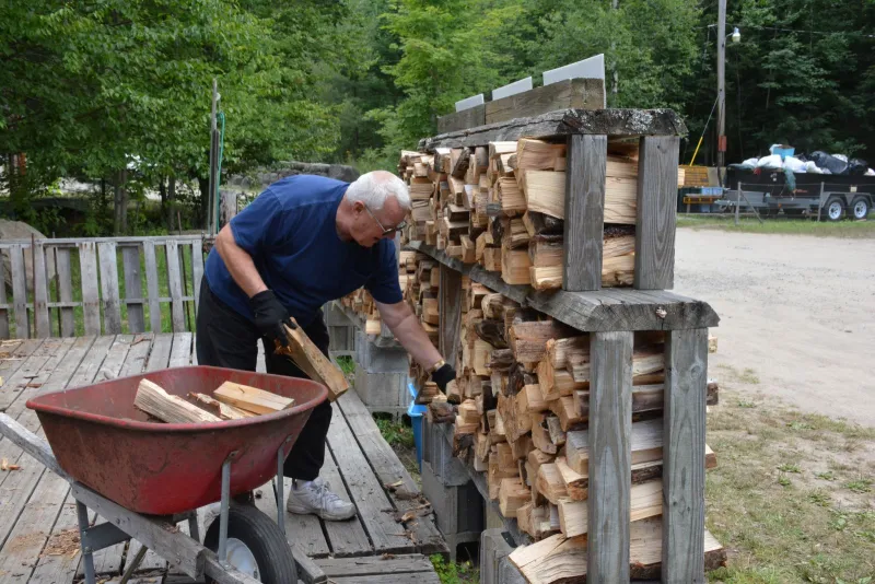 Richard Antalek of Naples, Florida has been coming to Blue Jay Campsite since 1970. He's originally from the Albany area and is a seasonal camper. He likes to help out with the firewood to keep himself busy and says he fills 10 or 12 bins of firewood a day.