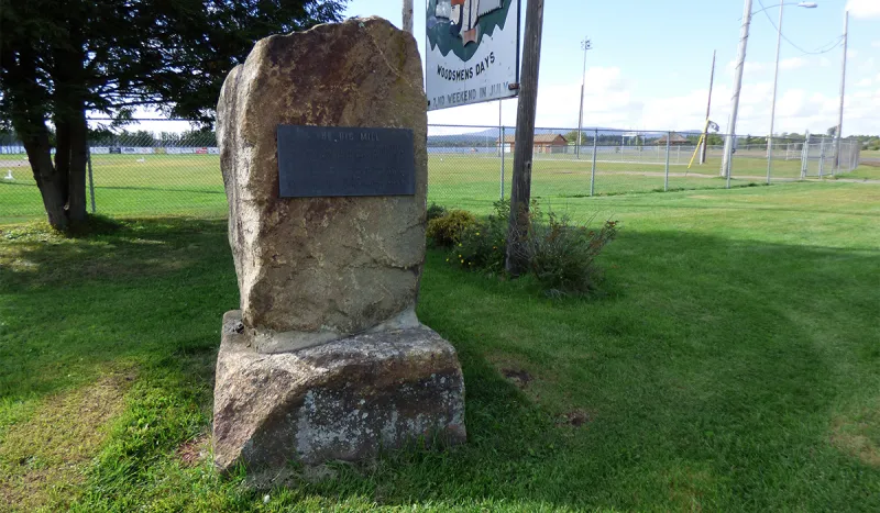 Monument in honor of The Big Mill stands in front of the softball field in the Tupper Lake Municipal Park.