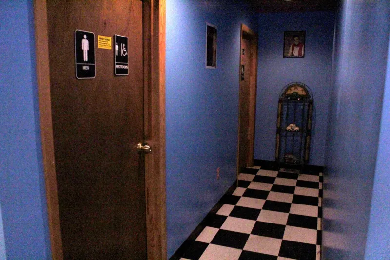 Two young men in 1920's attire have been seen in this hallway.