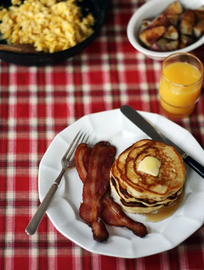 From top left: eggs, potatoes, orange juice, flapjacks, and bacon. Accept no substitutes!