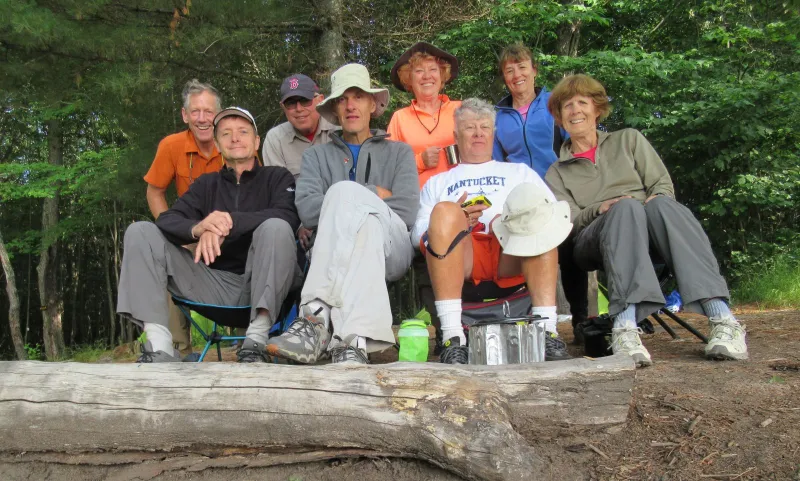 Low's Lake campers, July 2018, included (back row, left to right): John, Gerry, Peggy, Lisa. Front row, Jim, Dave, Bill, and Alison. We are all hooked on wilderness camping!