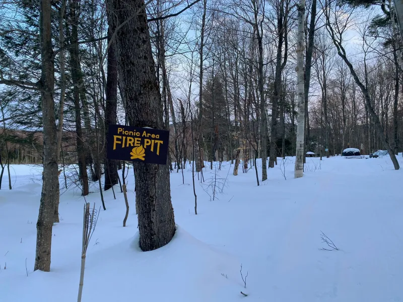 Sign for the fire pit where you can take a break and take in the views.