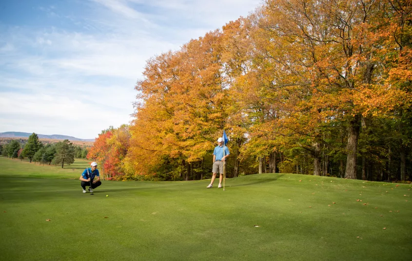 Player on the course in autumn