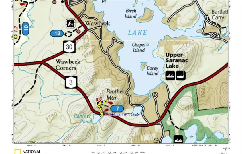 A map with a hiking trail and larger lake