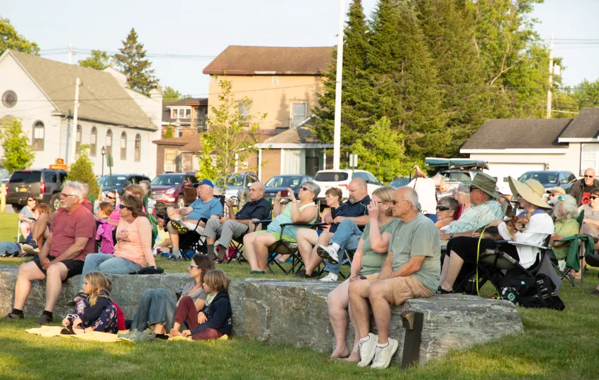 People listening to live music at a park
