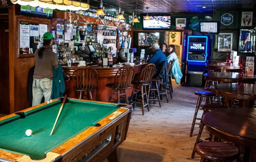 Billards table and a view of the bar.