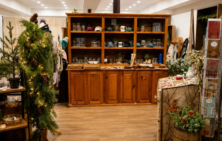 Decor on display in a large hutch with shelves.