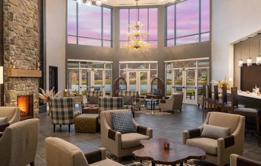 Grand loby space with stone fireplace