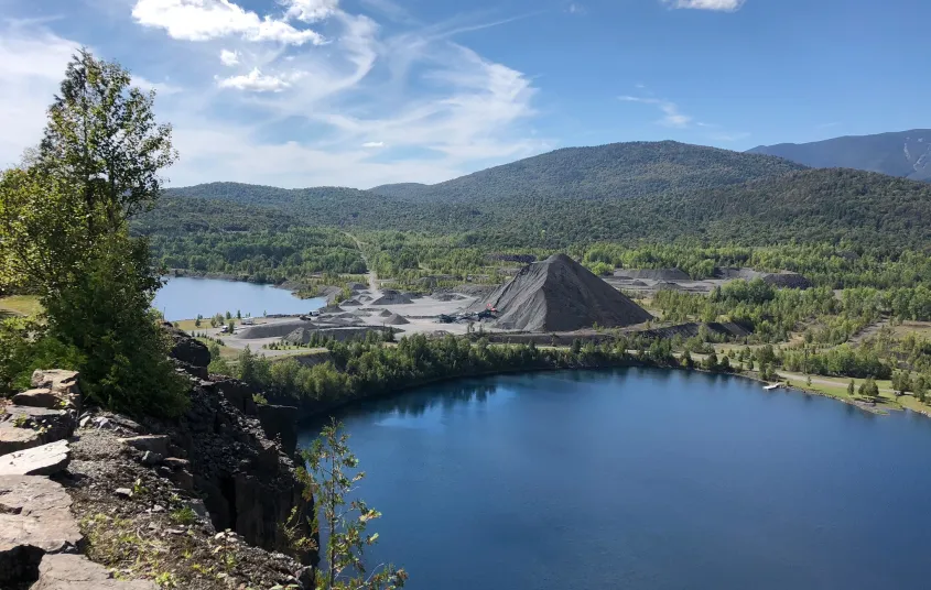 Blue skies over a body of water.