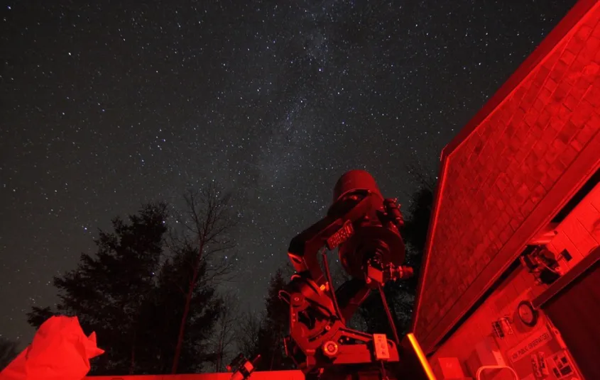 A telescope looks up at the stars