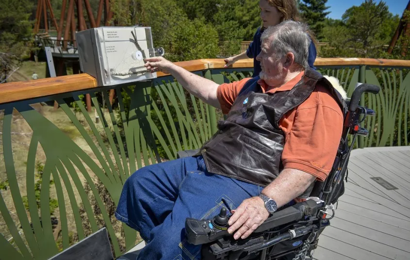 View of children watching a school of fish in an exhibit