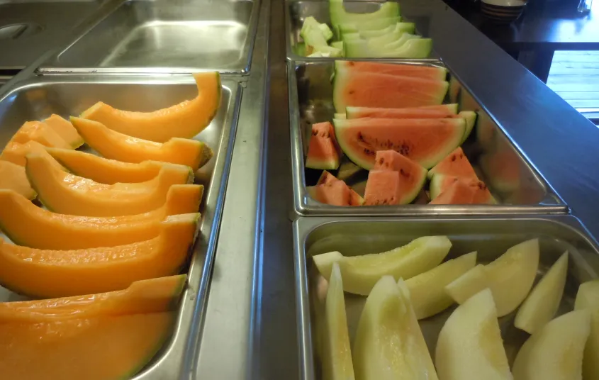 Sliced melons on display