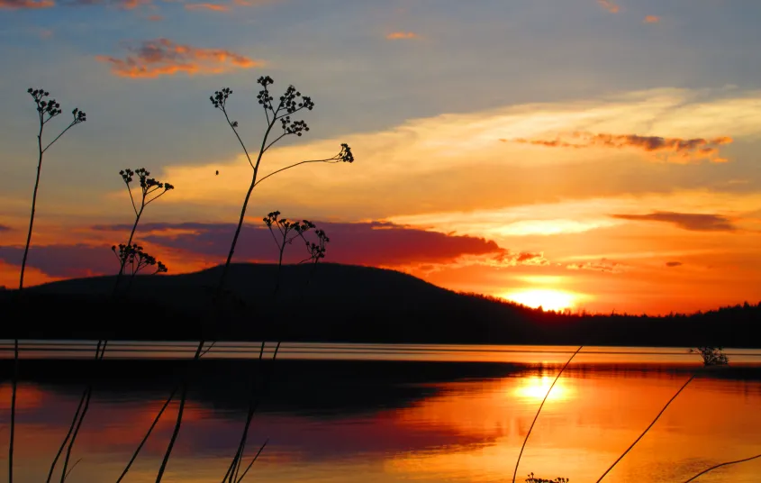 Orange sunset over the lake.
