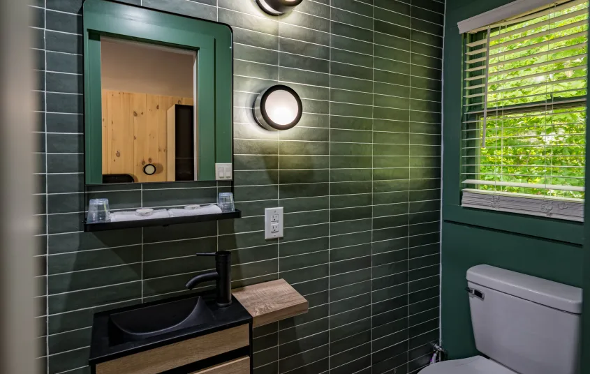 Emerald green tiles with white grout