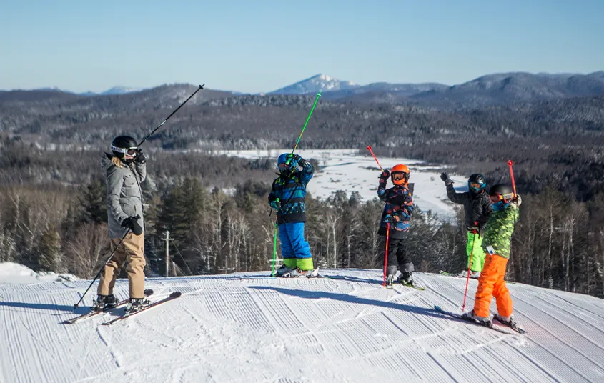 A group of skiers on top of Mount Pisgah