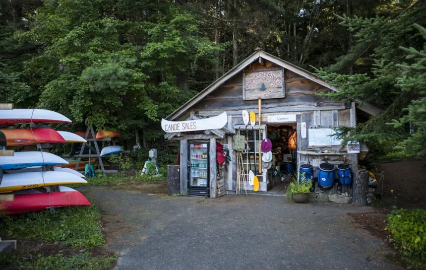 A small structure surrounded with adventure gear.
