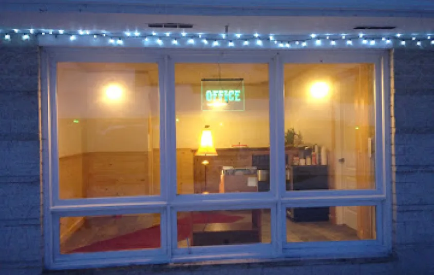 Looking through the window at Tupper Lake Motel.