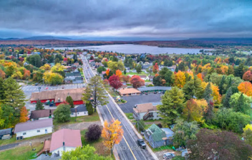 View of the lake and the road through Tupper Lake in the fall.