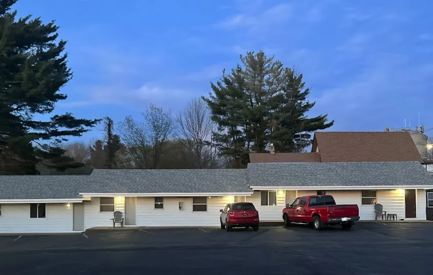 The exterior of the white motel.